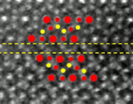 Atomic structure of the (111) twin defect in Fe3O4